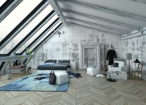 Loft-style bedroom with industrial-type decor and large roof windows.