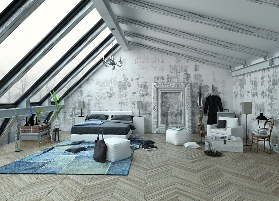 Loft-style bedroom with industrial-type decor and large roof windows.