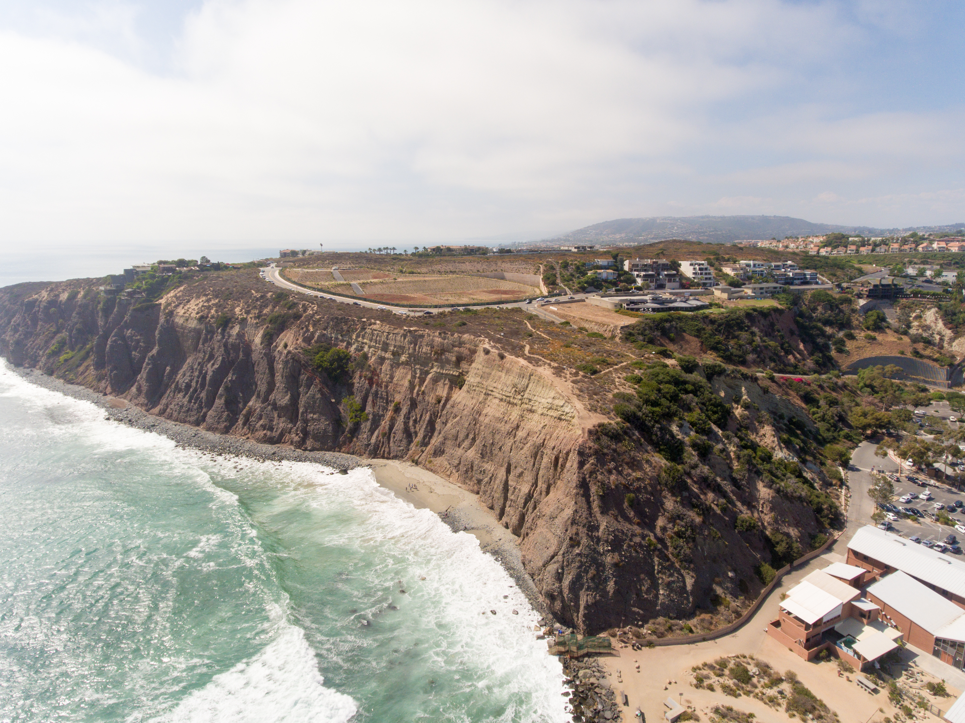 arial view of the cliffs and beach of Dana Point, CA